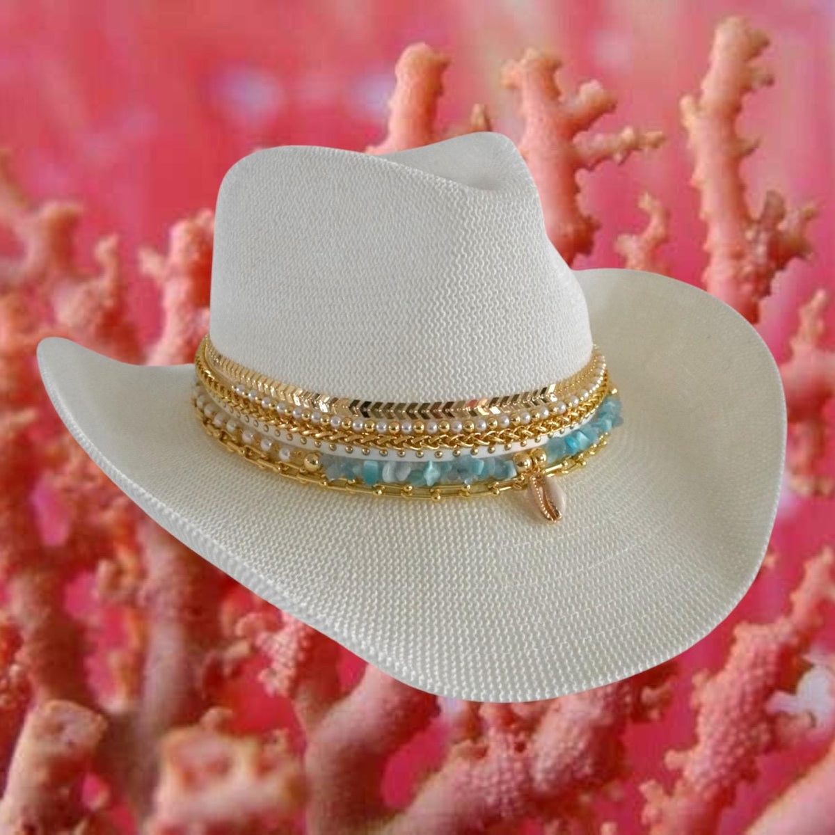 White straw cowboy hat by Sunkissed by Chrissy, perfect for beach vacations and resort wear, featuring a boho coastal style.