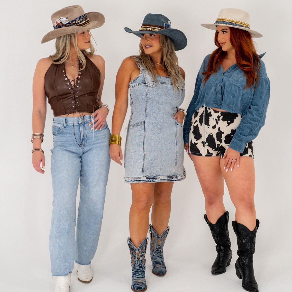 Blue cowboy hat by Sunkissed by Chrissy with 18k gold and jeweled embellishments, perfect for country concerts and western style.