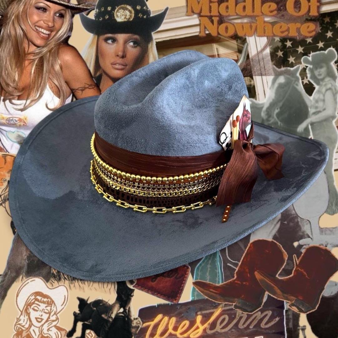 Blue cowboy hat by Sunkissed by Chrissy with 18k gold jeweled accents, perfect for country concerts and Western style outfits.