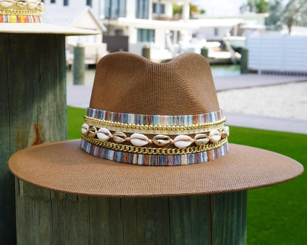 Sunkissed by Chrissy women's waterproof wide brim boater hat with straw Panama design, jute band, gold embellishments, beach style.