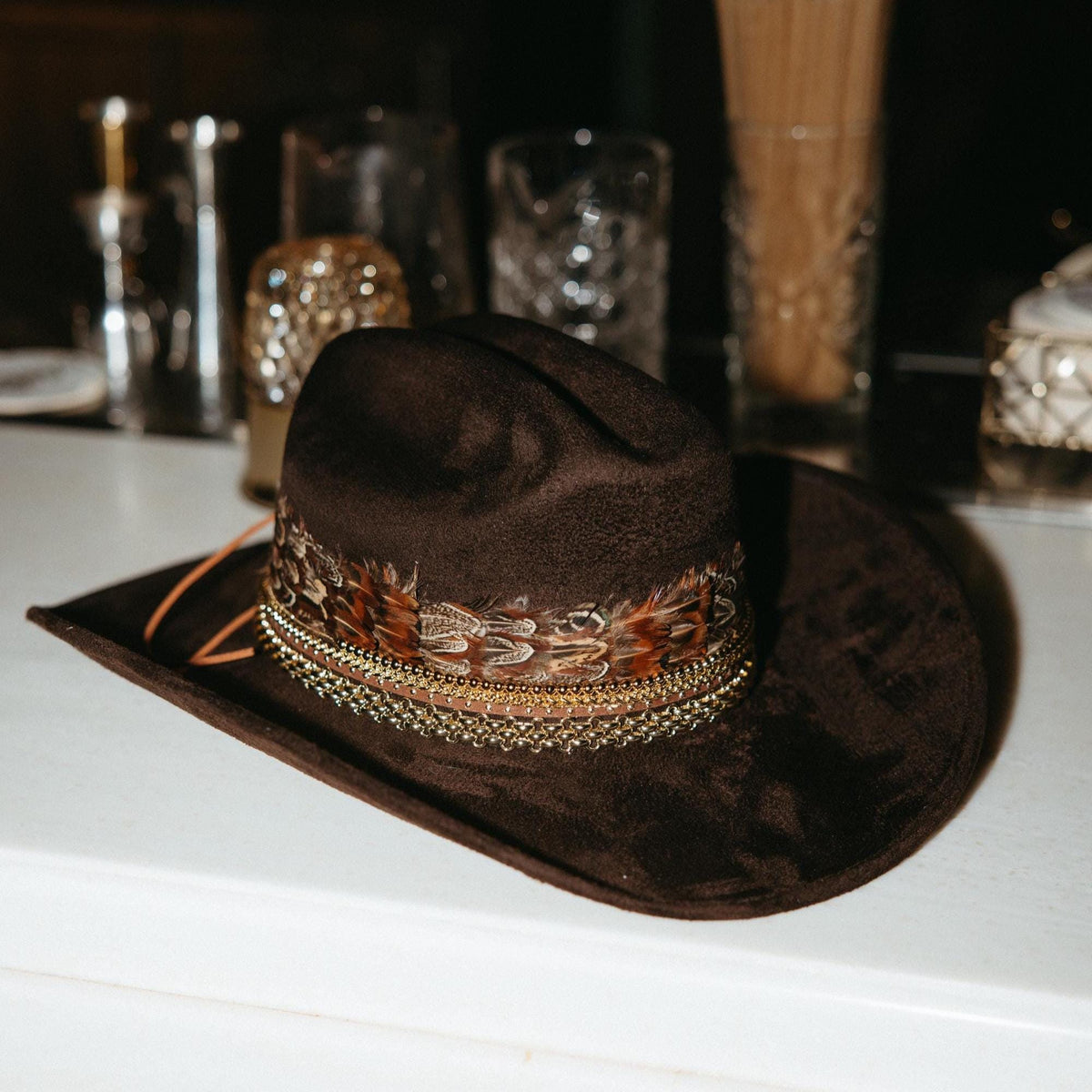 Sunkissed by Chrissy feather cowboy hat for women, Western style rodeo and country fashion accessory with chic, personalized design.
