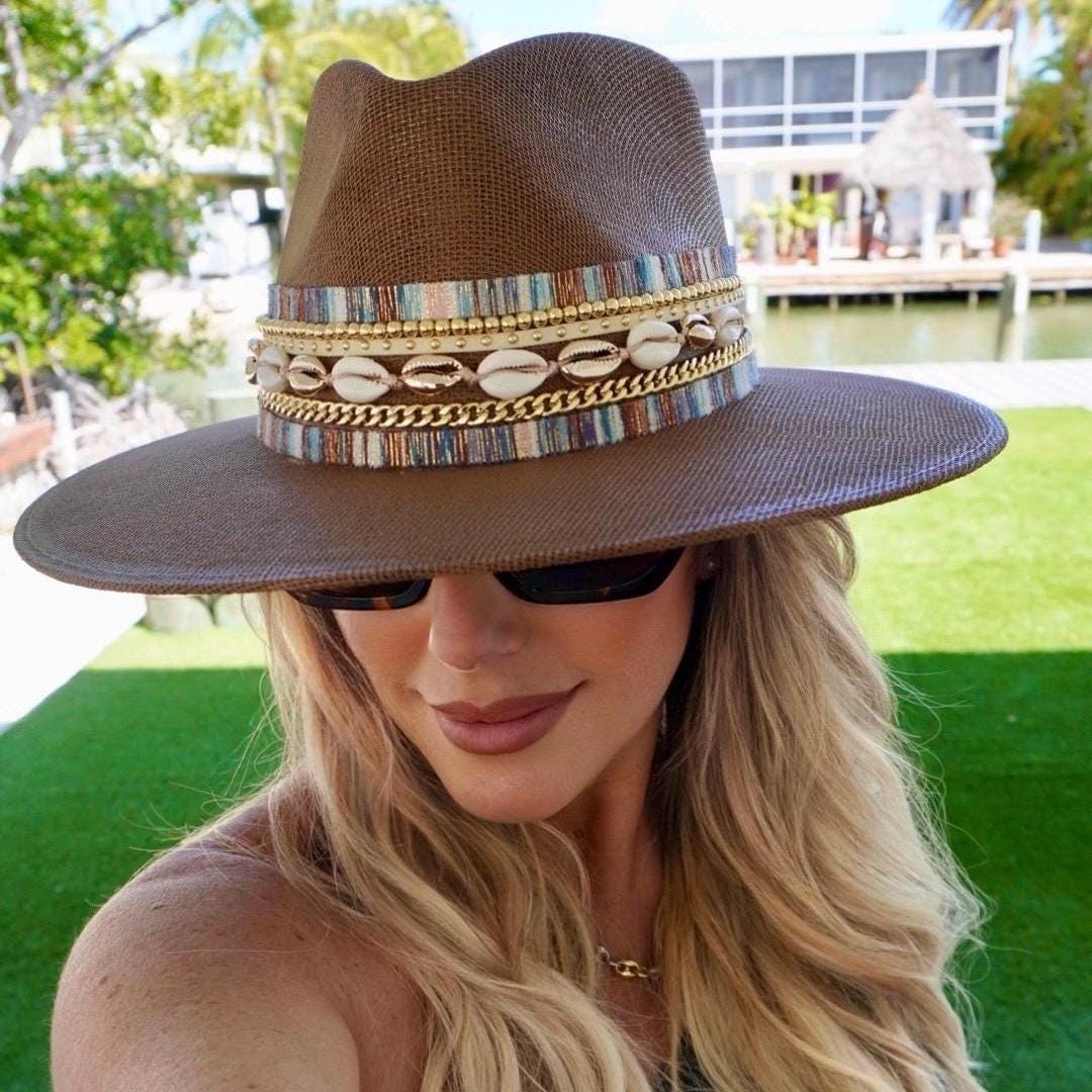 Sunkissed by Chrissy women's waterproof wide brim boater hat with straw and jute design, gold embellishments, perfect for beach and resort style.