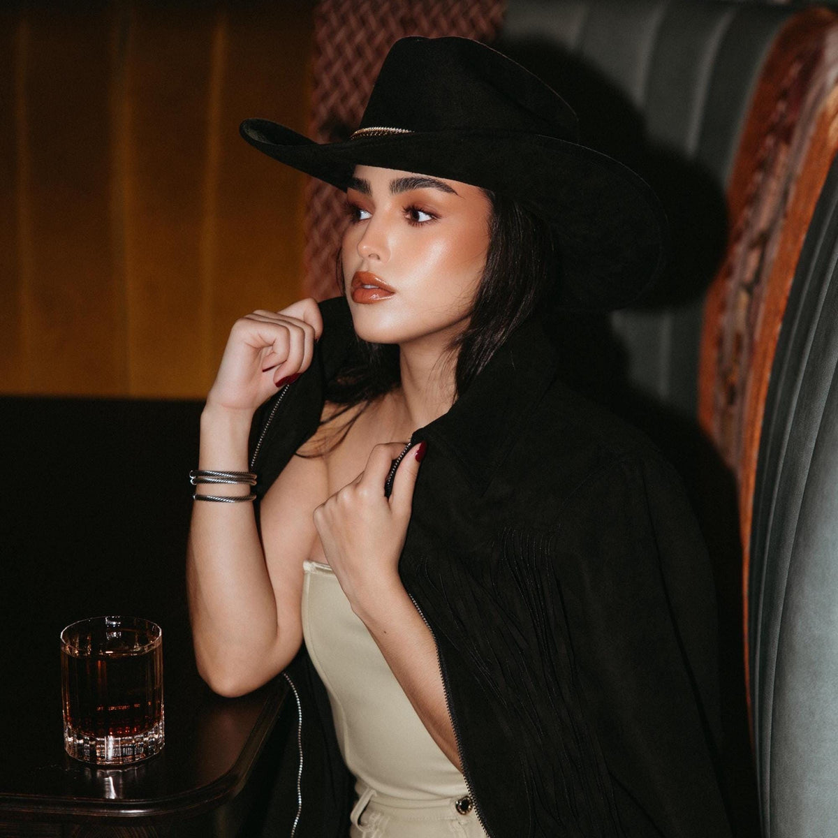 Sunkissed by Chrissy feather cowboy hat for women, Western style, perfect for rodeo, country fashion, and outdoor events.