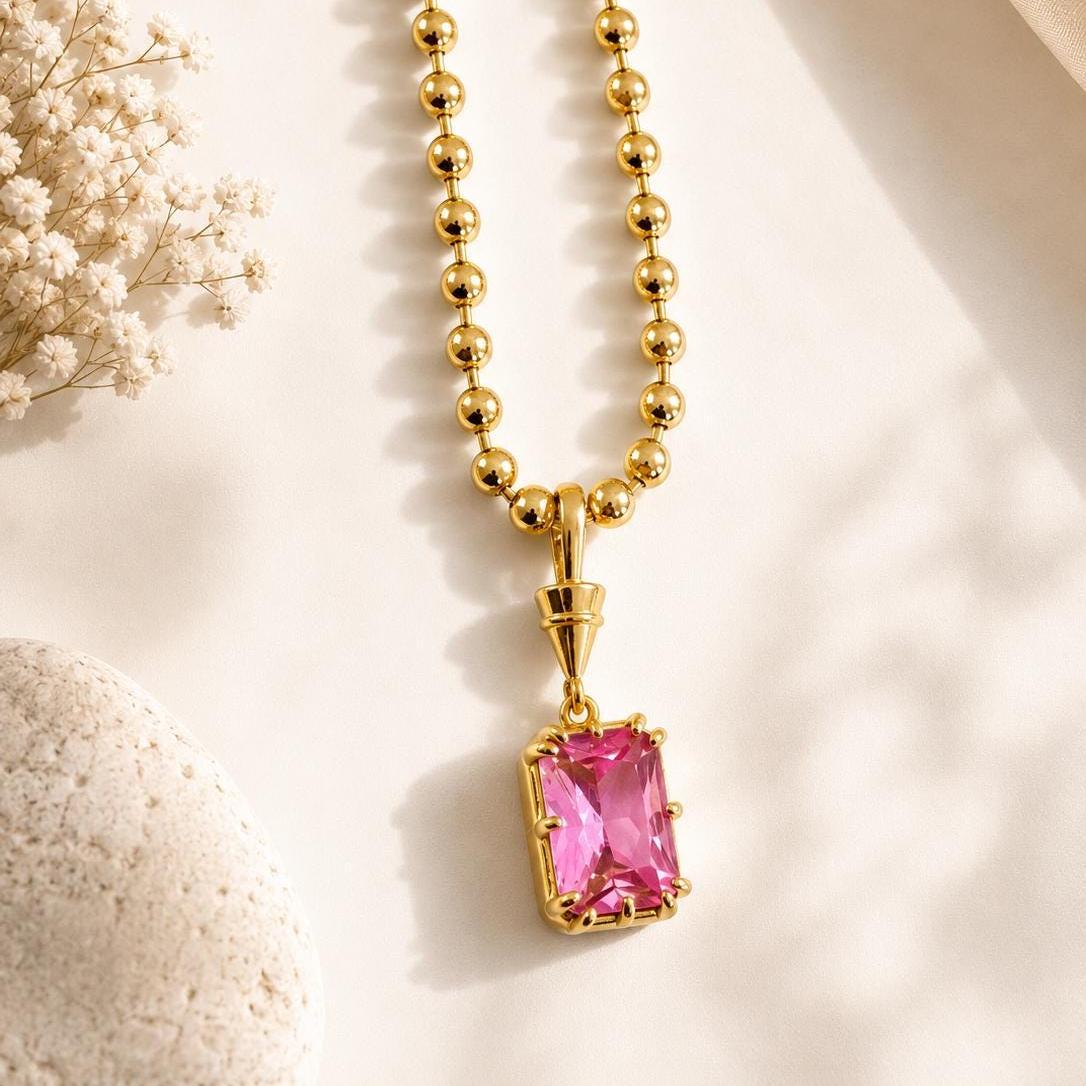 Gold gemstone pendant necklace with solitaire birthstone, elegant dainty jewelry by Sunkissed by Chrissy, perfect for layering or everyday wear.