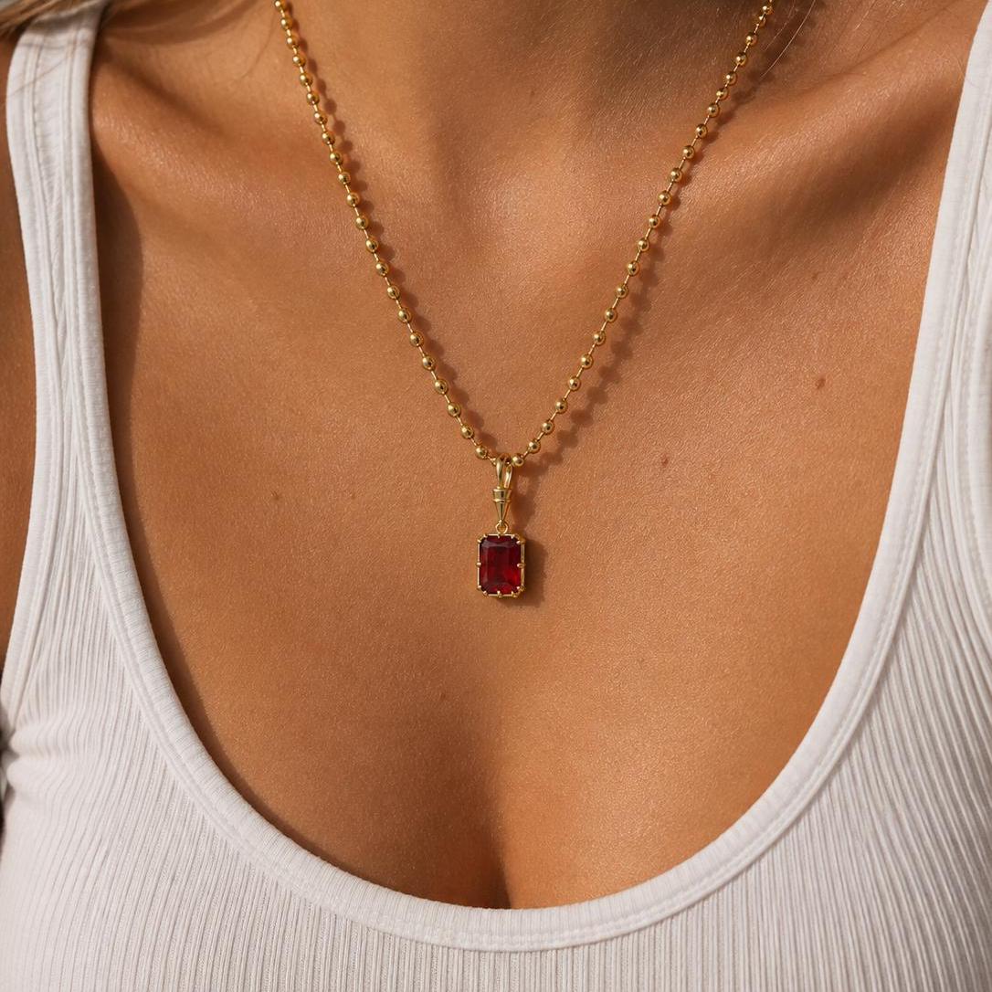 Dainty gold gemstone pendant necklace with solitaire birthstone design, elegant jewelry by Sunkissed by Chrissy for everyday style