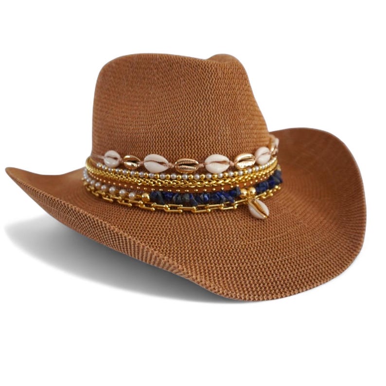 Jeweled cowboy beach hat by Sunkissed by Chrissy featuring straw material, decorative shells, perfect for tropical vacation wear.