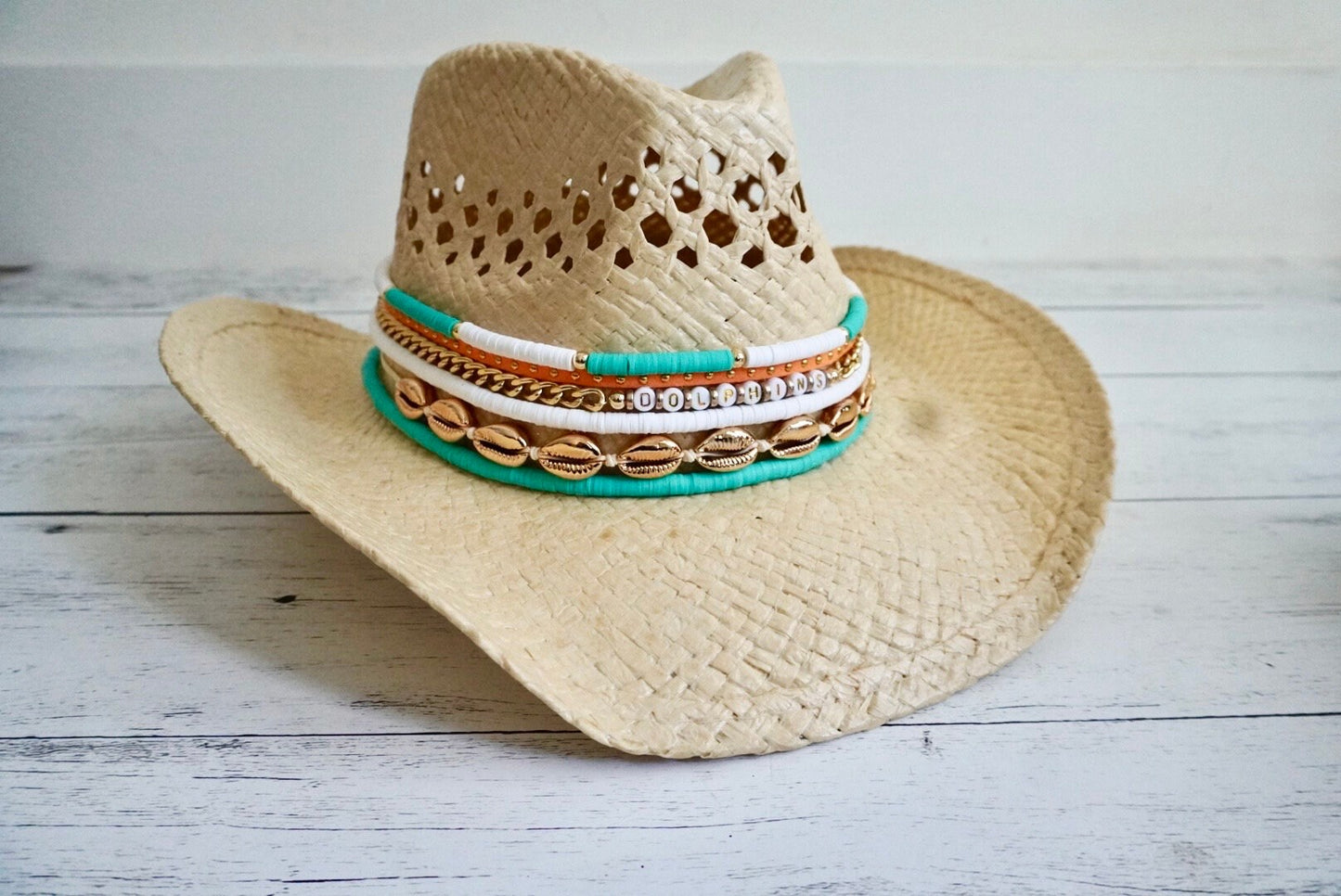Sunkissed by Chrissy Miami Dolphins cowboy hat with jeweled dolphin and fins design, perfect for Dolphins fans.