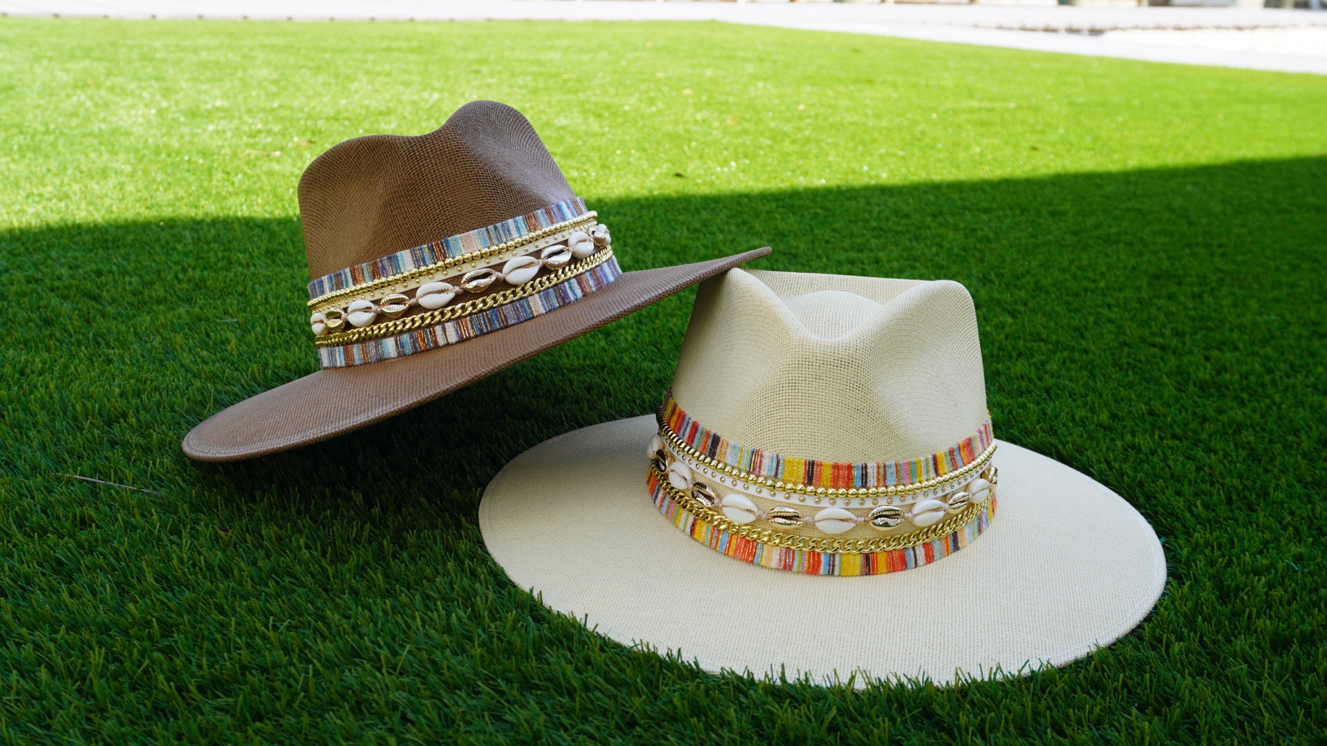 Water-resistant beach hat by Sunkissed by Chrissy featuring shells, coastal jute material, and a classic Panama boater style for women.