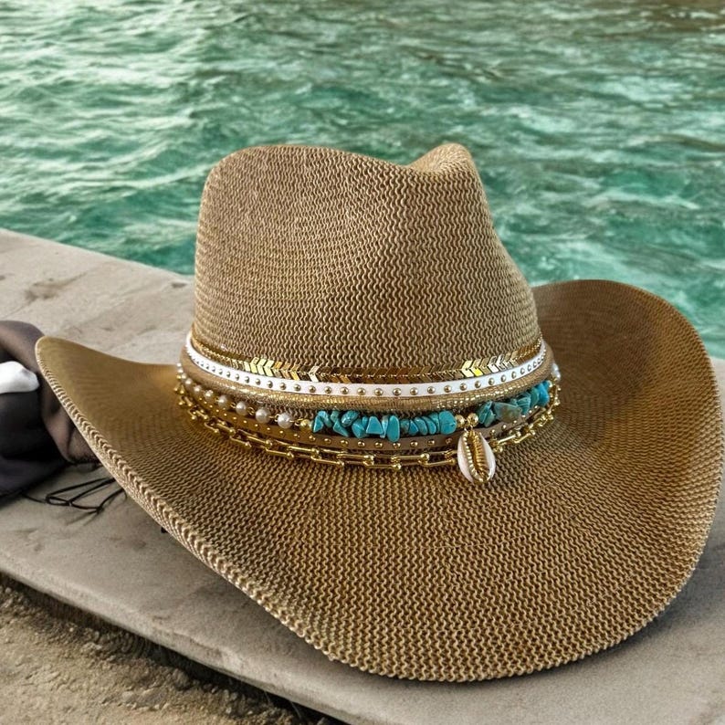 Sunkissed by Chrissy Coastal Cowgirl summer straw beach hat with jeweled accents and turquoise shell embellishments for resort wear.