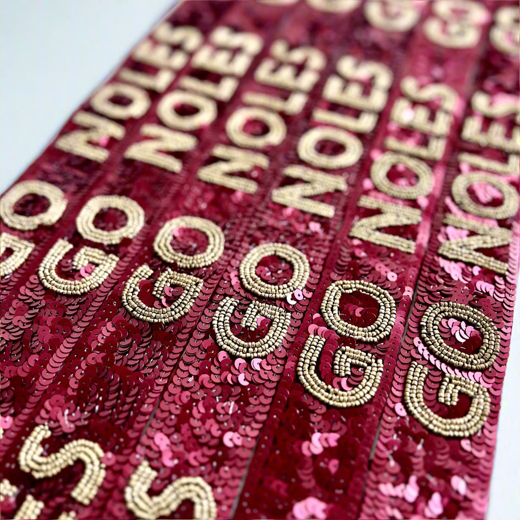 Beaded sequin purse strap from Sunkissed by Chrissy featuring colorful beads and sparkling sequins for stylish accessories.