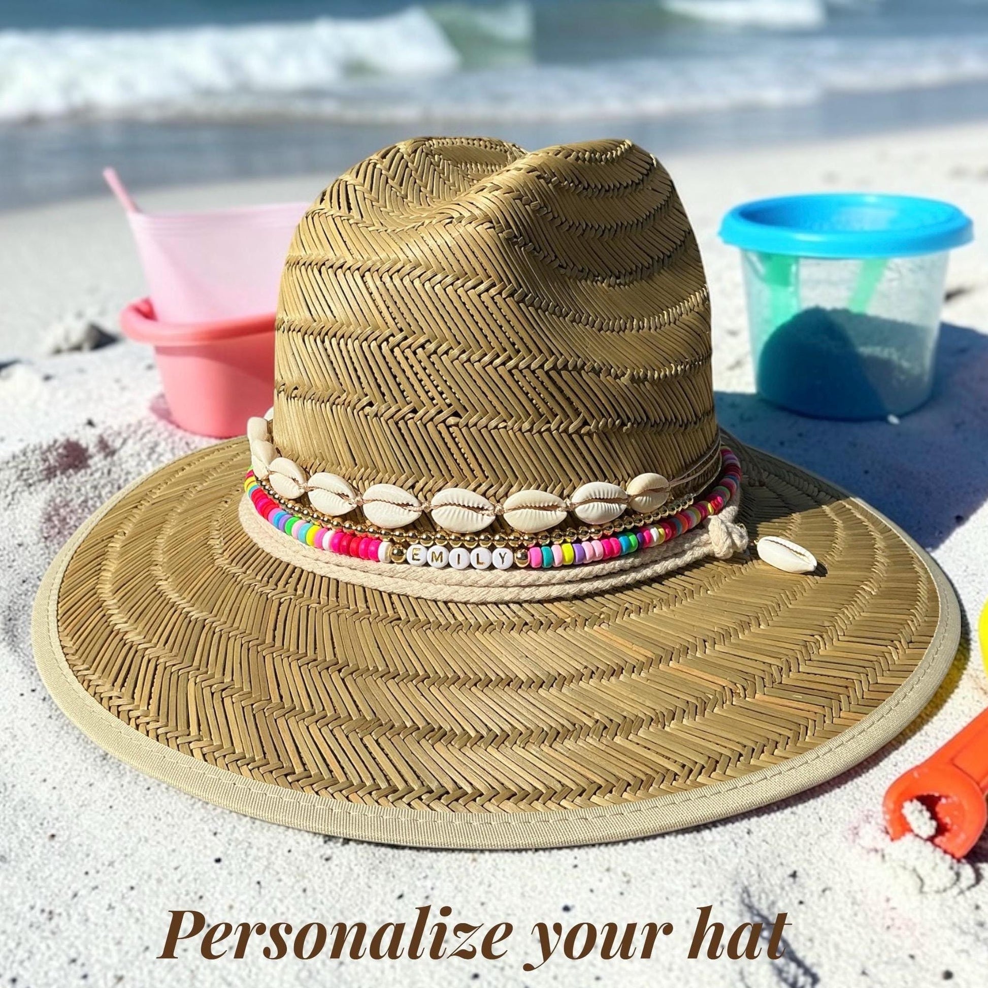 Personalized toddler sun hat by Sunkissed by Chrissy with beads and cowrie shells, perfect for girls’ summer beach outings.
