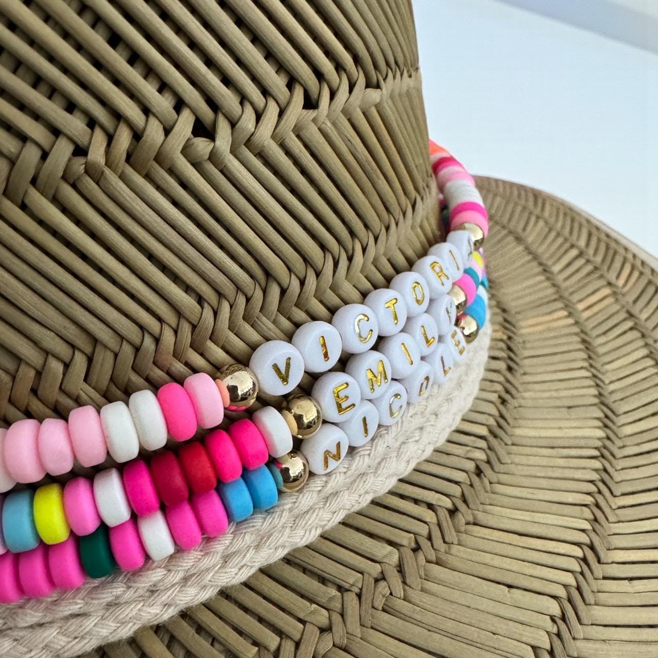 Personalized toddler sun hat by Sunkissed by Chrissy with beads and cowrie shells, perfect for kids' summer beach outings.