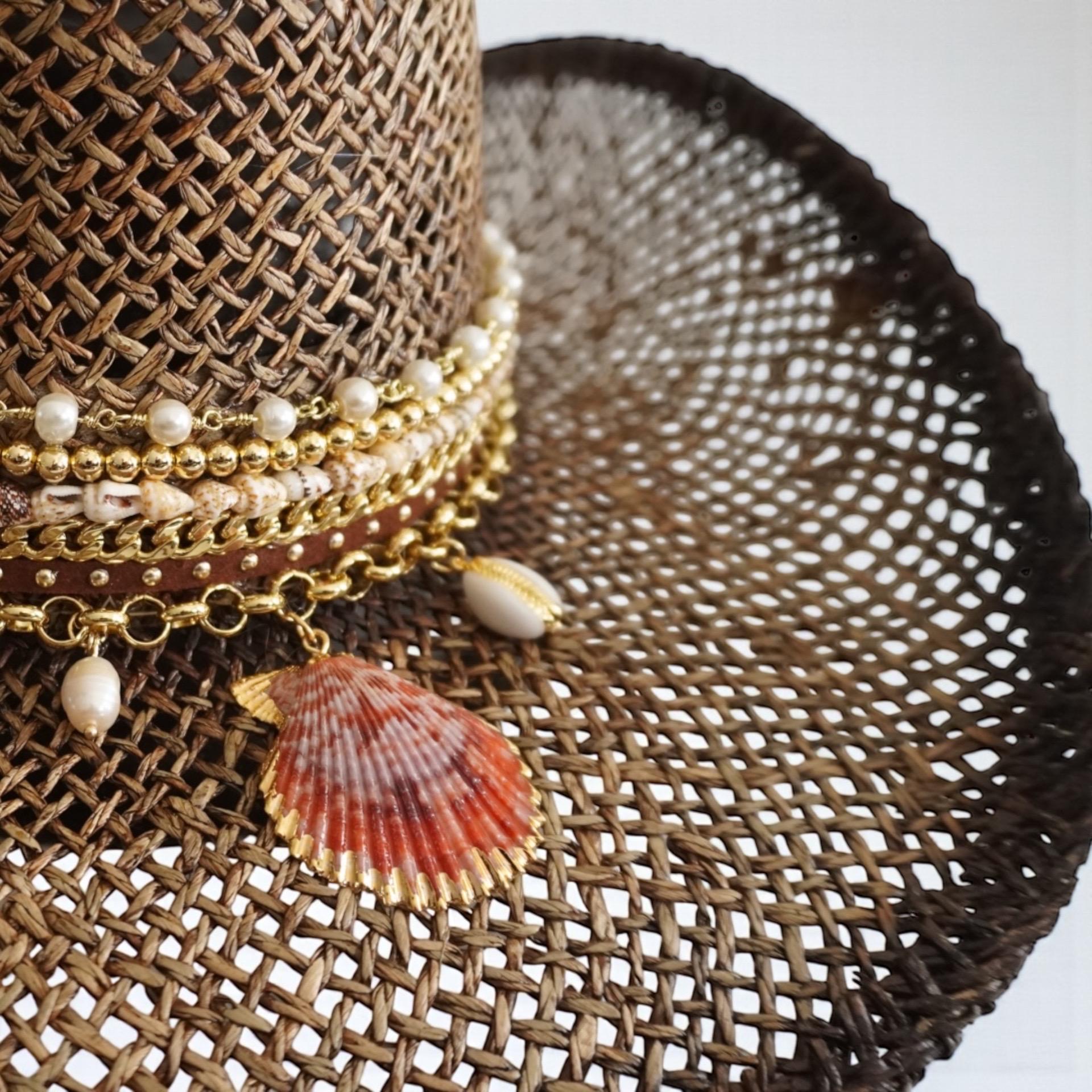 Brown straw cowboy hat with beaded seashell charm, perfect for summer festivals, beach, or resort vacations by Sunkissed by Chrissy.