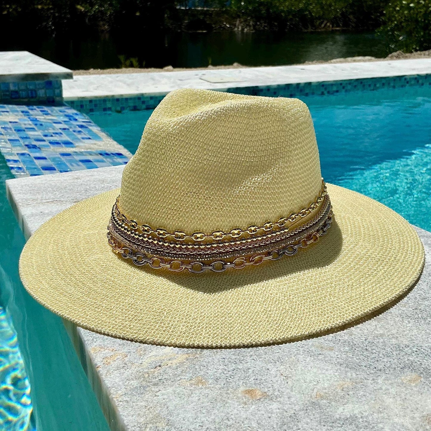 Mixed metal chain wide brim sun hat for women with gold and silver accents, perfect for beach and resort vacations.