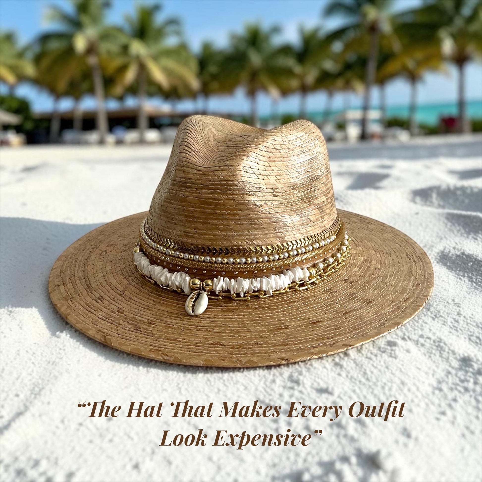 Luxury Panama hat by Sunkissed by Chrissy with wide brim, gold chain, pearls, shells, perfect for beach and resort summer wear.