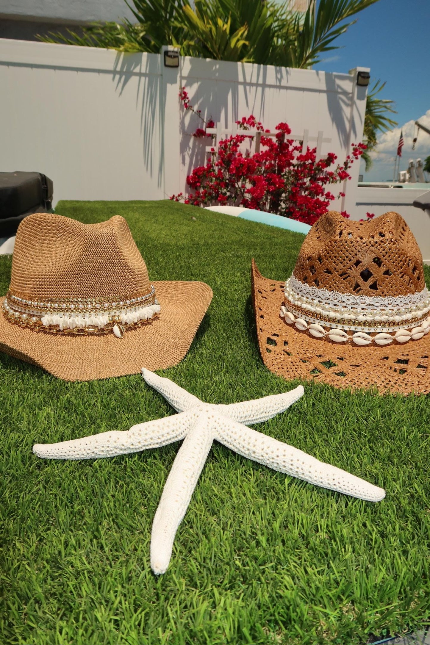Luxury straw cowboy hat for women with wide brim, shell trim, boho style, perfect for beach, resort, or summer coastal wear.