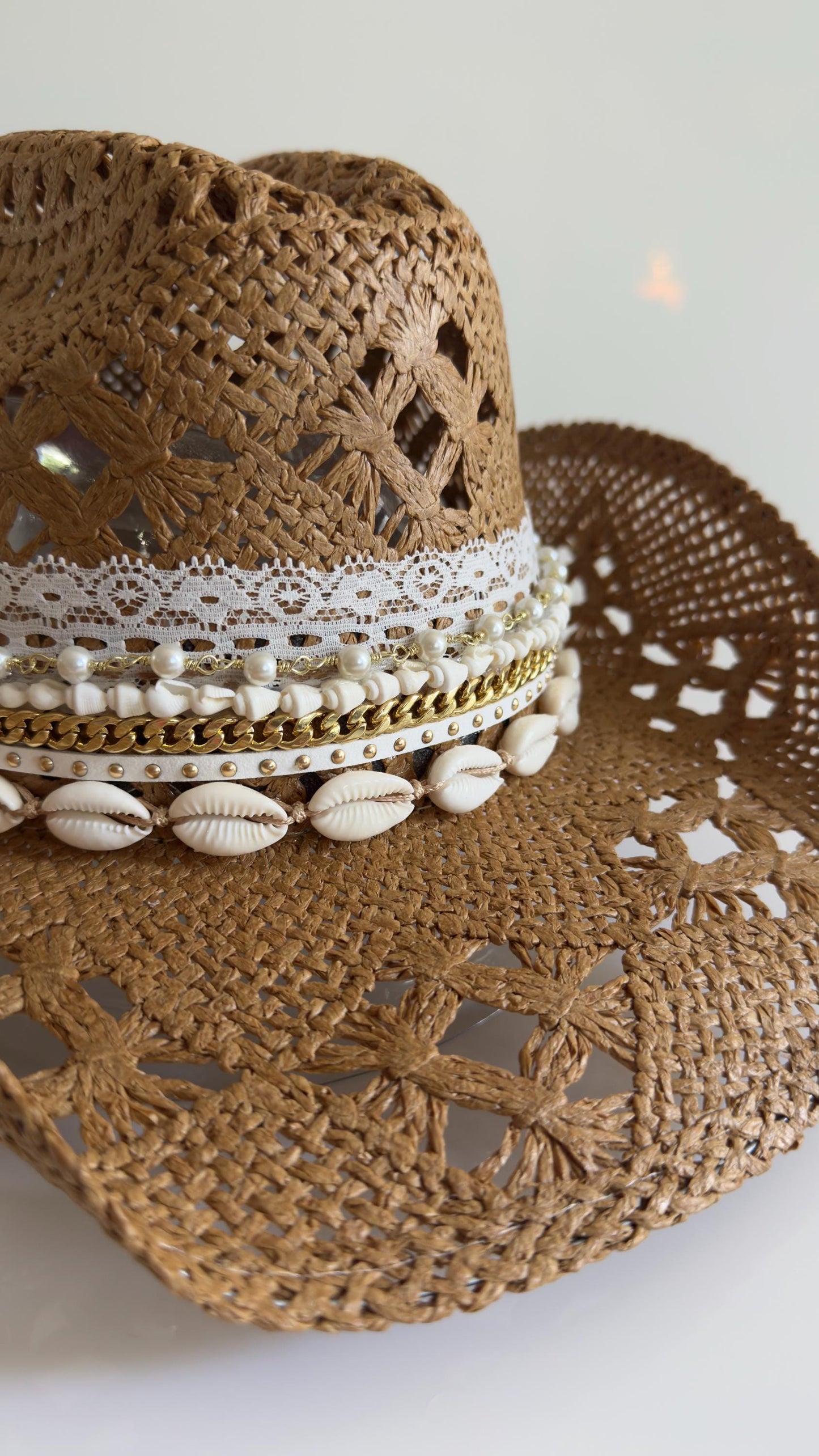 Luxury straw cowboy hat for women by Sunkissed by Chrissy, wide brim boho beach hat with shell trim for summer resort style.