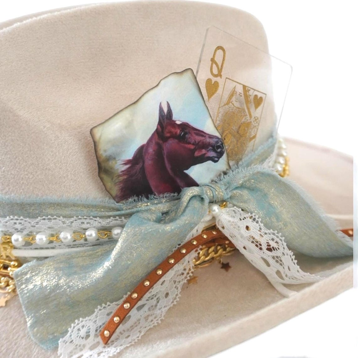 Custom coastal cowgirl hat by Sunkissed by Chrissy featuring shabby chic style, jeweled western design, perfect for bachelorette beach events.