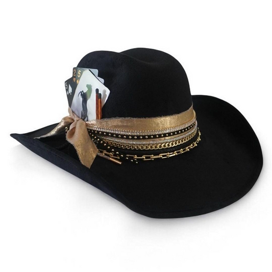 Black cowboy hat with jeweled embellishments, custom western style for ski, concert, or travel outfits, by Sunkissed by Chrissy.