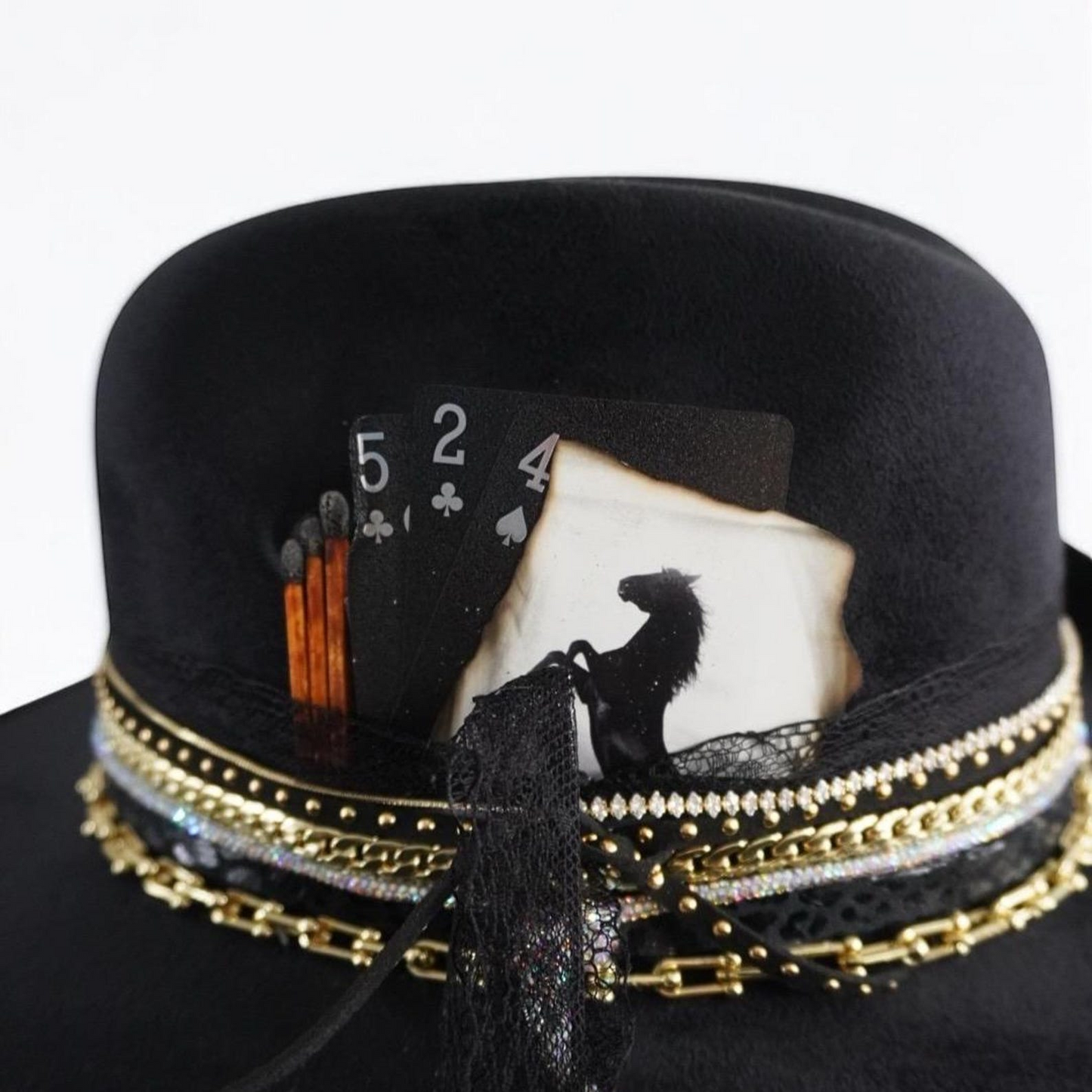 Black cowboy hat with jeweled accents, Western glam style, perfect for rodeo, concert, or travel outfits by Sunkissed by Chrissy.