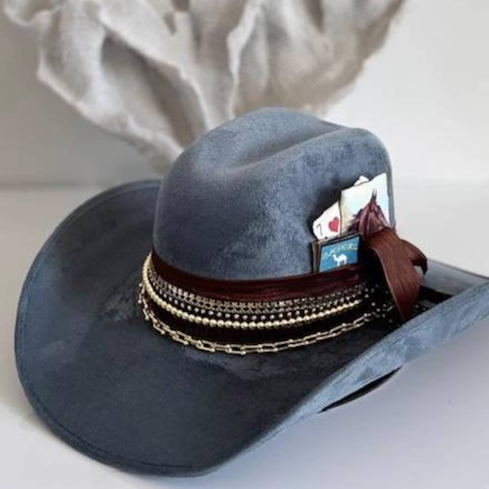 Western Glam Jeweled Cowgirl Hat by Sunkissed by Chrissy with custom embellishments, featuring rhinestones and decorative accents.