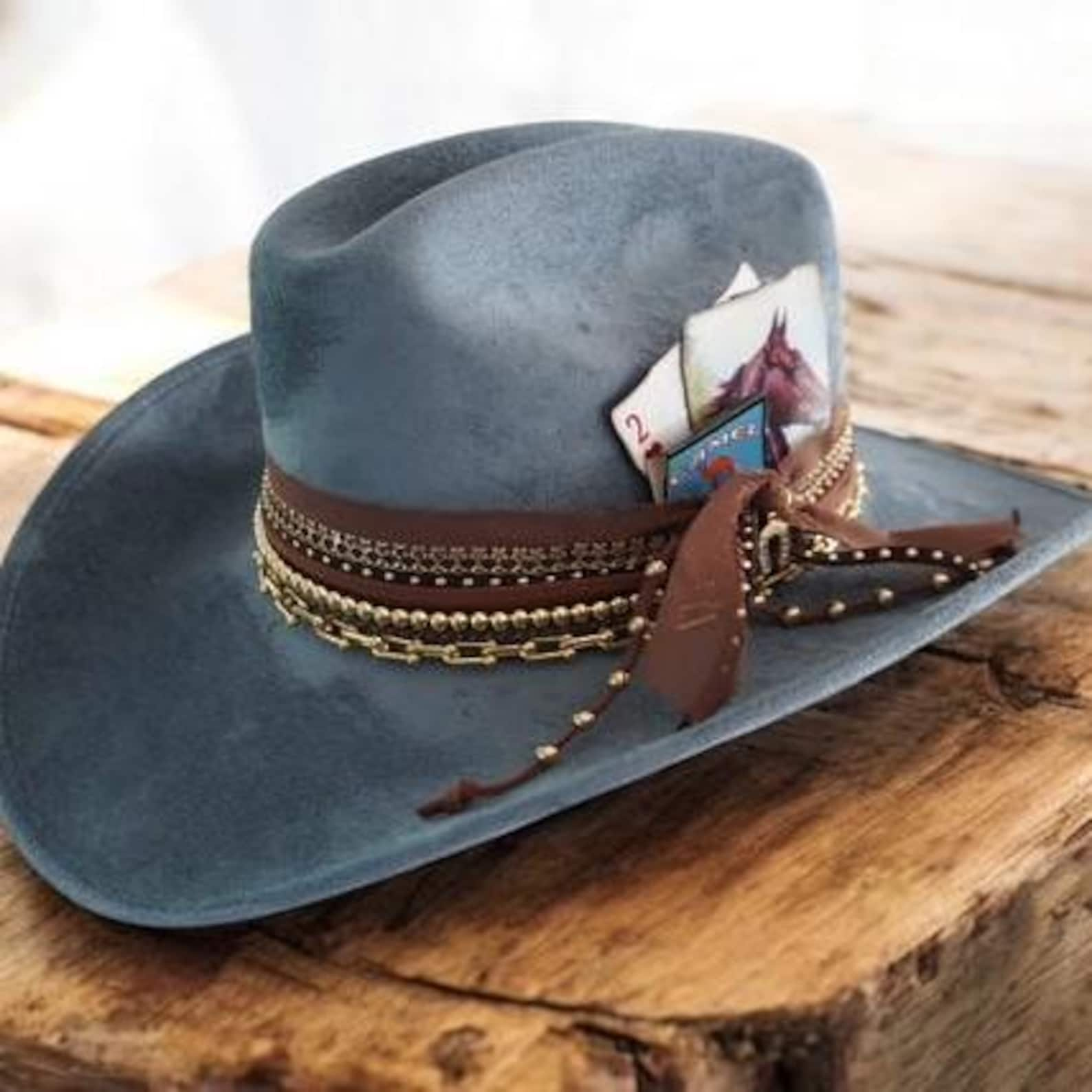 Western Glam Jeweled Cowgirl Hat by Sunkissed by Chrissy with custom embellishments and sparkling rhinestones for rodeo or concert wear.