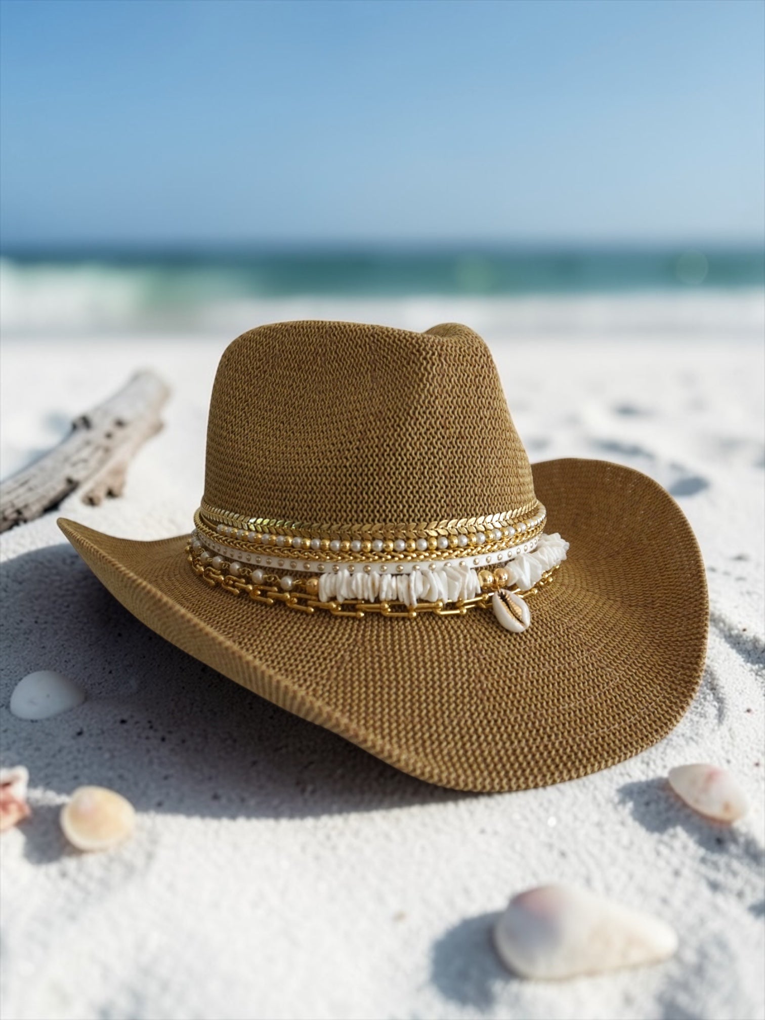 Tan Coastal Cowgirl Jeweled hat with shell accents from Sunkissed by Chrissy, perfect for beach, resort, or yacht vacation wear.