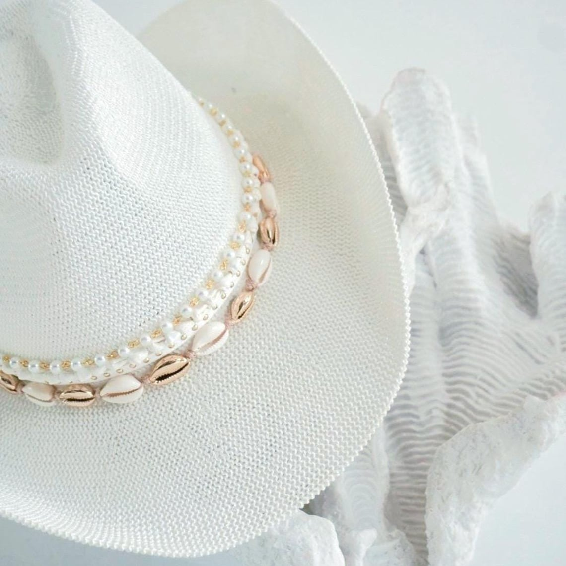 White Coastal cowgirl custom hat with jewels, beach vacation resort wear, perfect for bachelorette or island luxe bride to be.