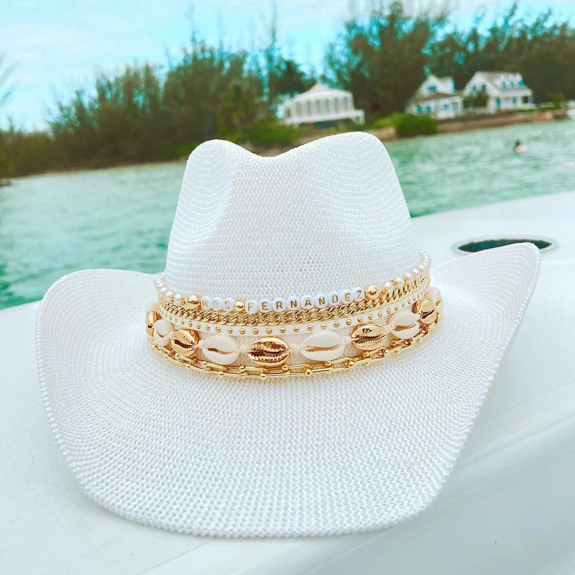 White Coastal cowgirl custom jeweled hat by Sunkissed by Chrissy, perfect for beach, resort, or bachelorette vacation wear.