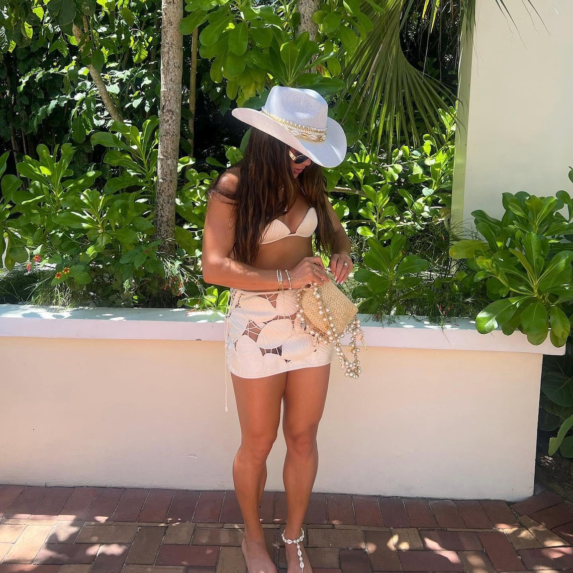 White coastal cowgirl custom jeweled hat by Sunkissed by Chrissy, perfect for beach vacations and bachelorette resort wear.