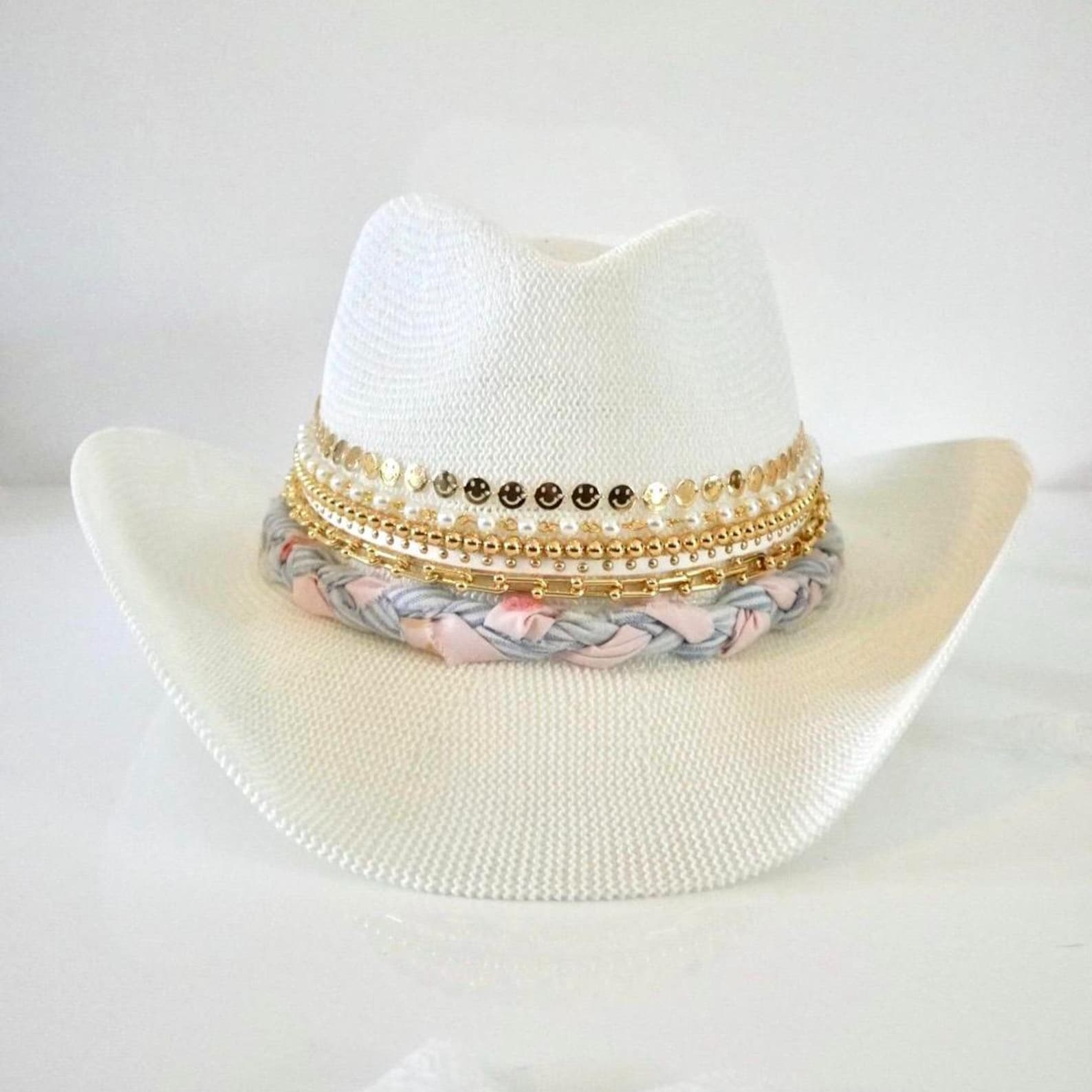 White Cowboy hat by Sunkissed by Chrissy with jeweled coquette bow embellishments, perfect for shabby chic, resort, and vacation wear.