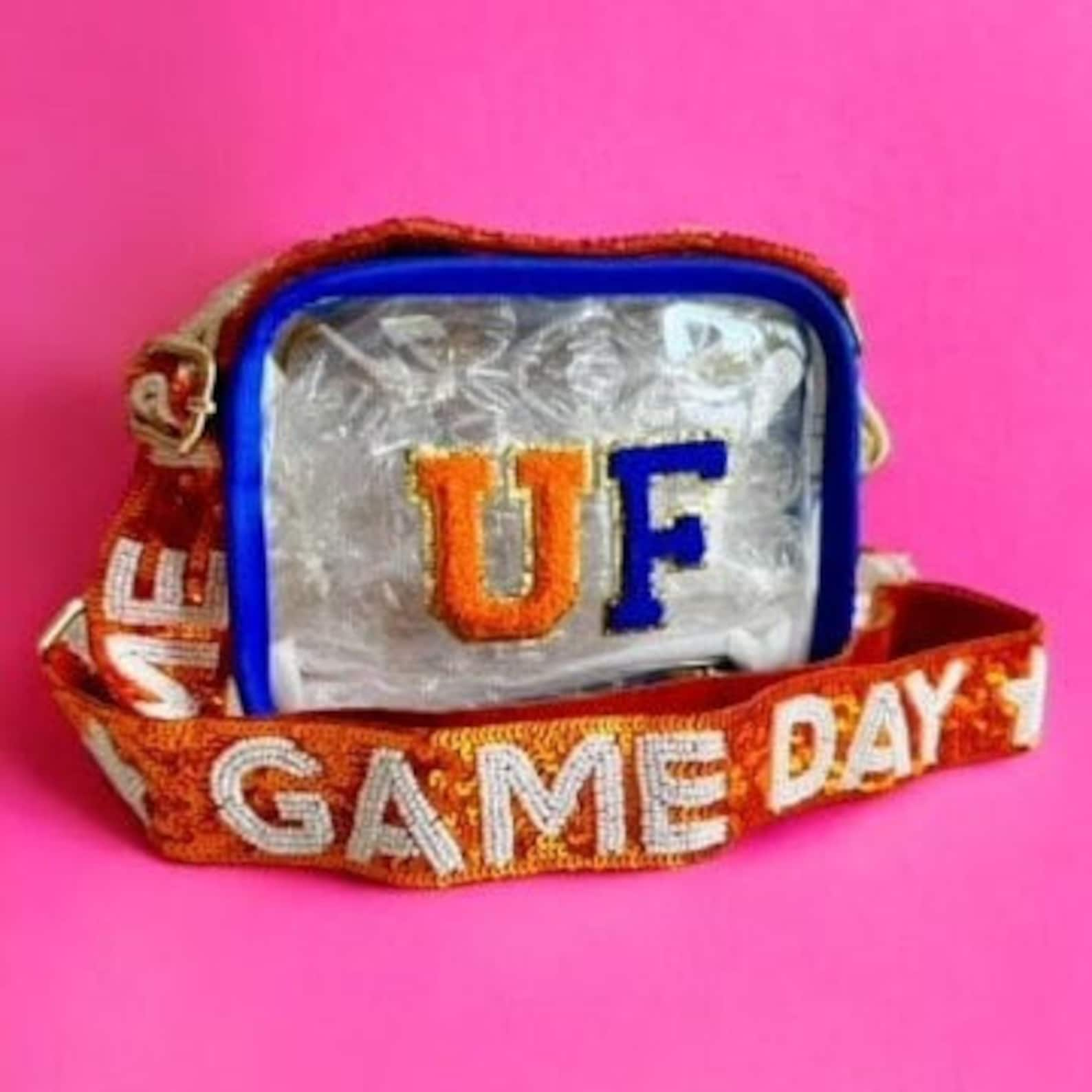 Clear stadium bag featuring UF Gators logo, with a Chomp strap, designed for University of Florida game days, stadium approved.