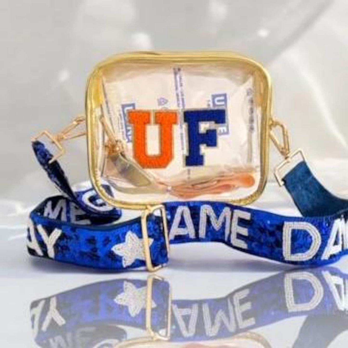 Clear stadium bag featuring UF Gators logo and chomp strap, ideal for University of Florida game day events.