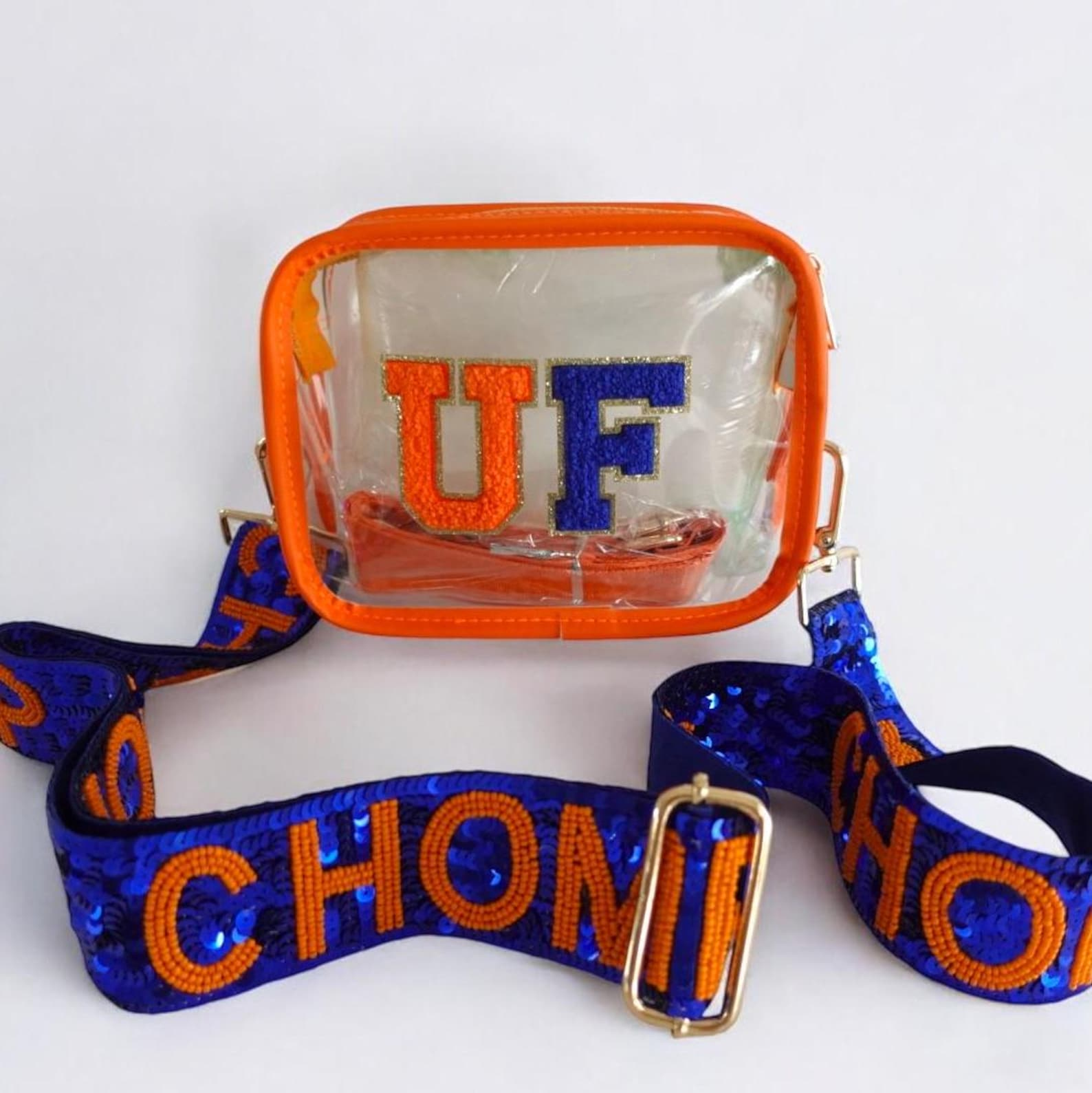 Clear stadium bag featuring UF Gators logo and chomp strap, designed for University of Florida game day events.