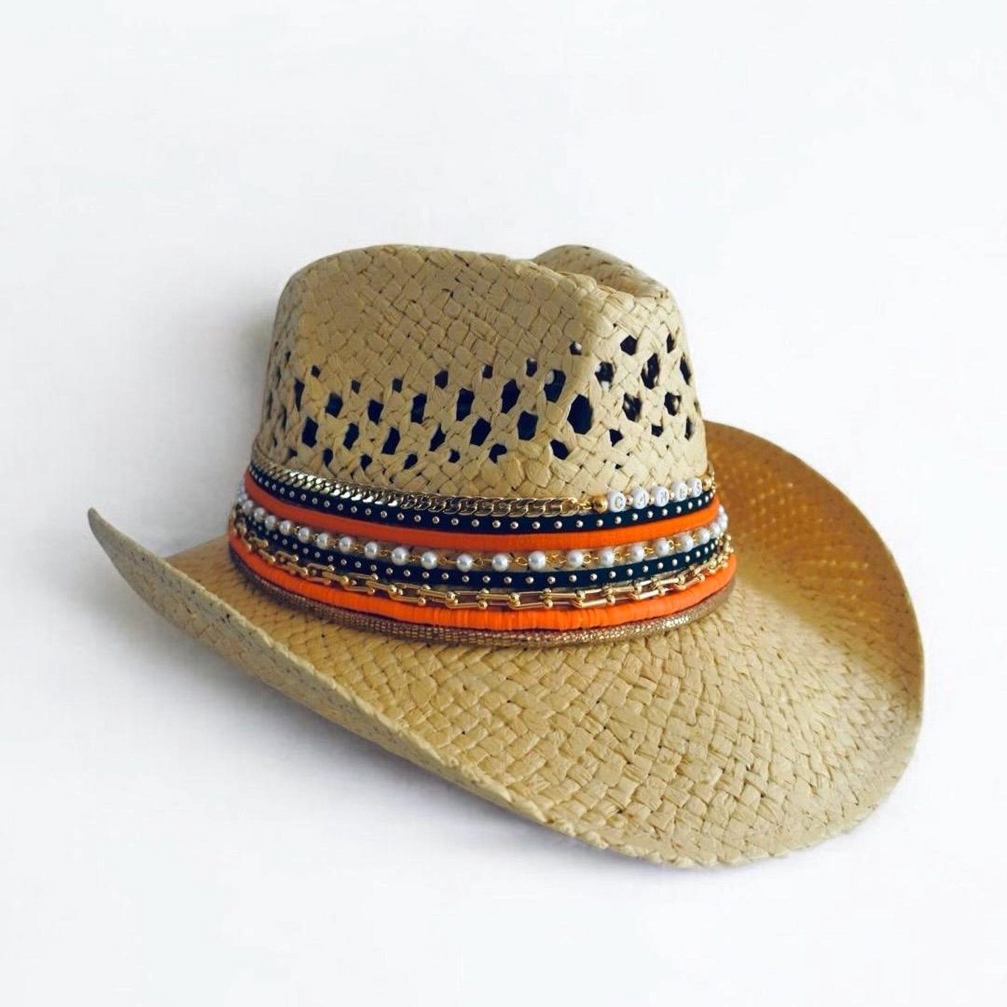 Miami Hurricanes cowboy hat by Sunkissed by Chrissy featuring UMiami logo, perfect for tailgates and University of Miami fan events.