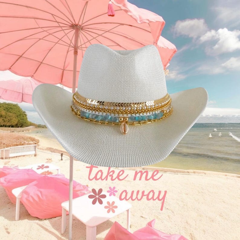 Luxury white cowgirl beach hat with shells and gold jewelry, handmade straw hat perfect for summer resortwear and coastal adventures.