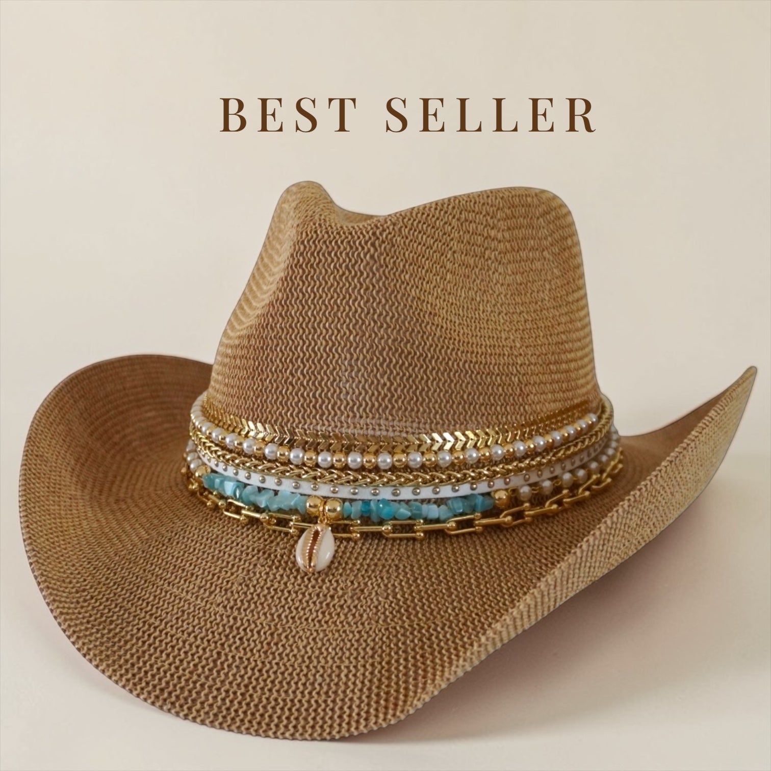 White cowgirl beach hat with shells and gold jewelry, handmade straw hat featuring boho style for summer resortwear by Sunkissed by Chrissy
