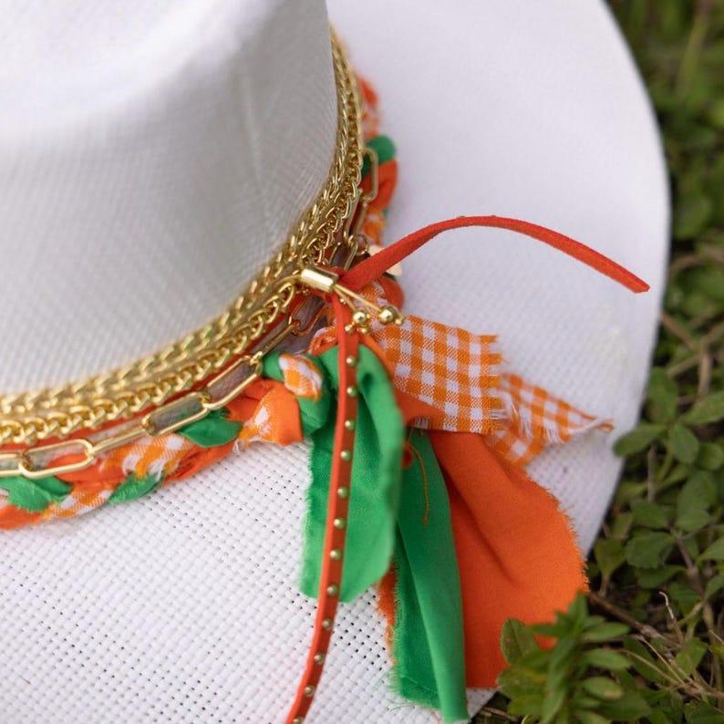 Sunkissed by Chrissy UM Hurricanes cowboy hat in orange and green, University of Miami game day western hat with Canes logo details.