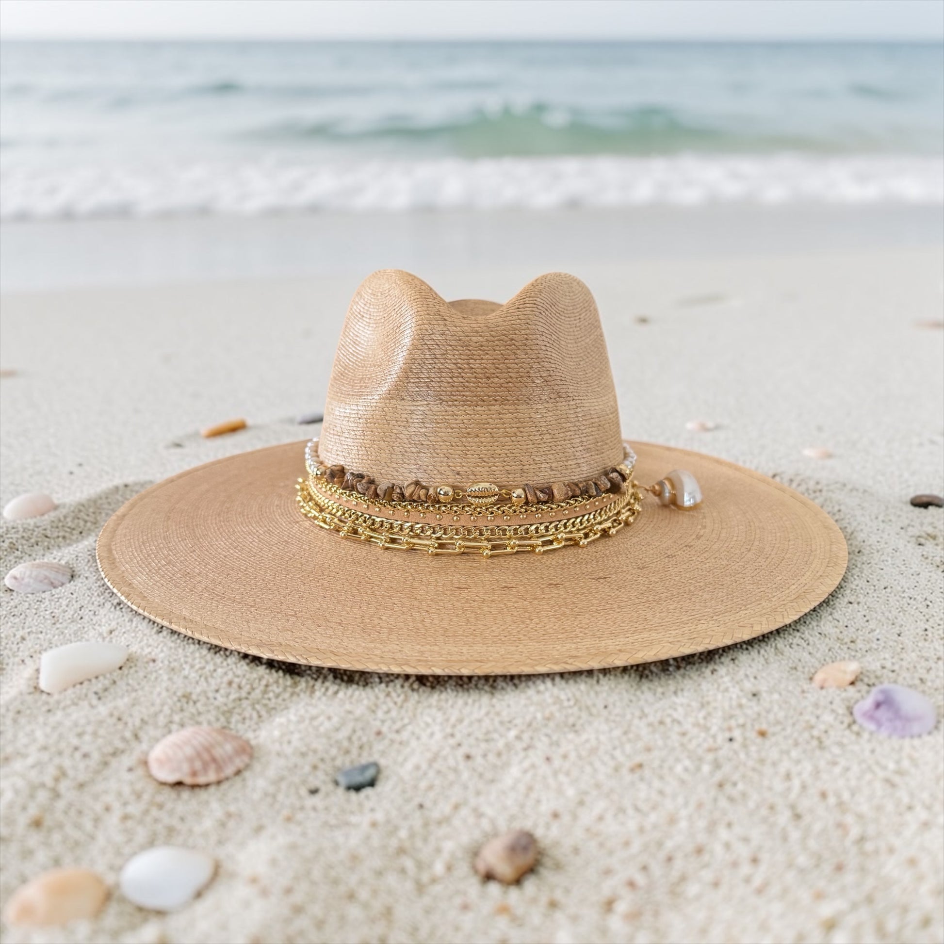 Sunkissed by Chrissy wide brim Panama hat with shell accents, perfect for beach resort and vacation wear.