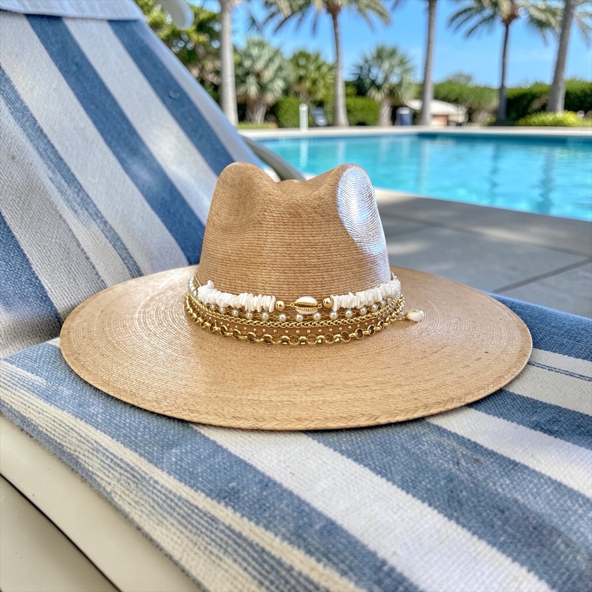 Sunkissed by Chrissy wide brim Palm Panama hat with shell accents, perfect for beach resort and vacation wear.